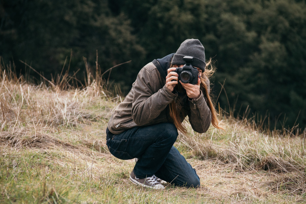 Self Portrait, with face obscured by a camera